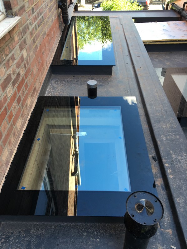 Multiple flat roof skylights on extension in Deptford